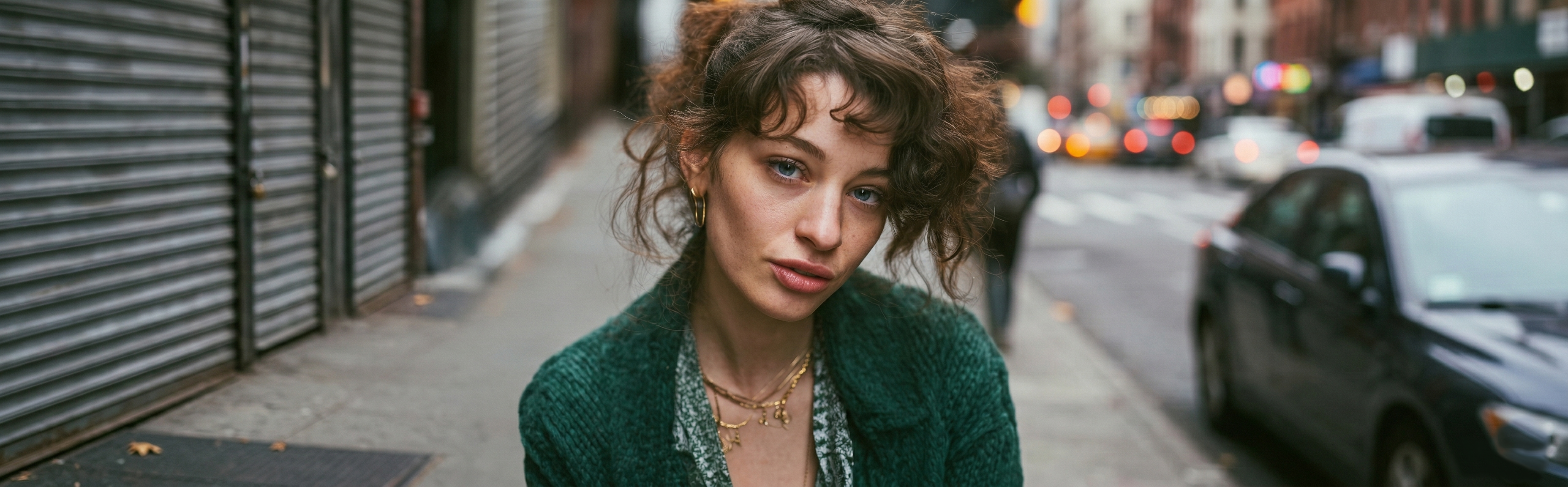 Portrait of woman in green cardigan